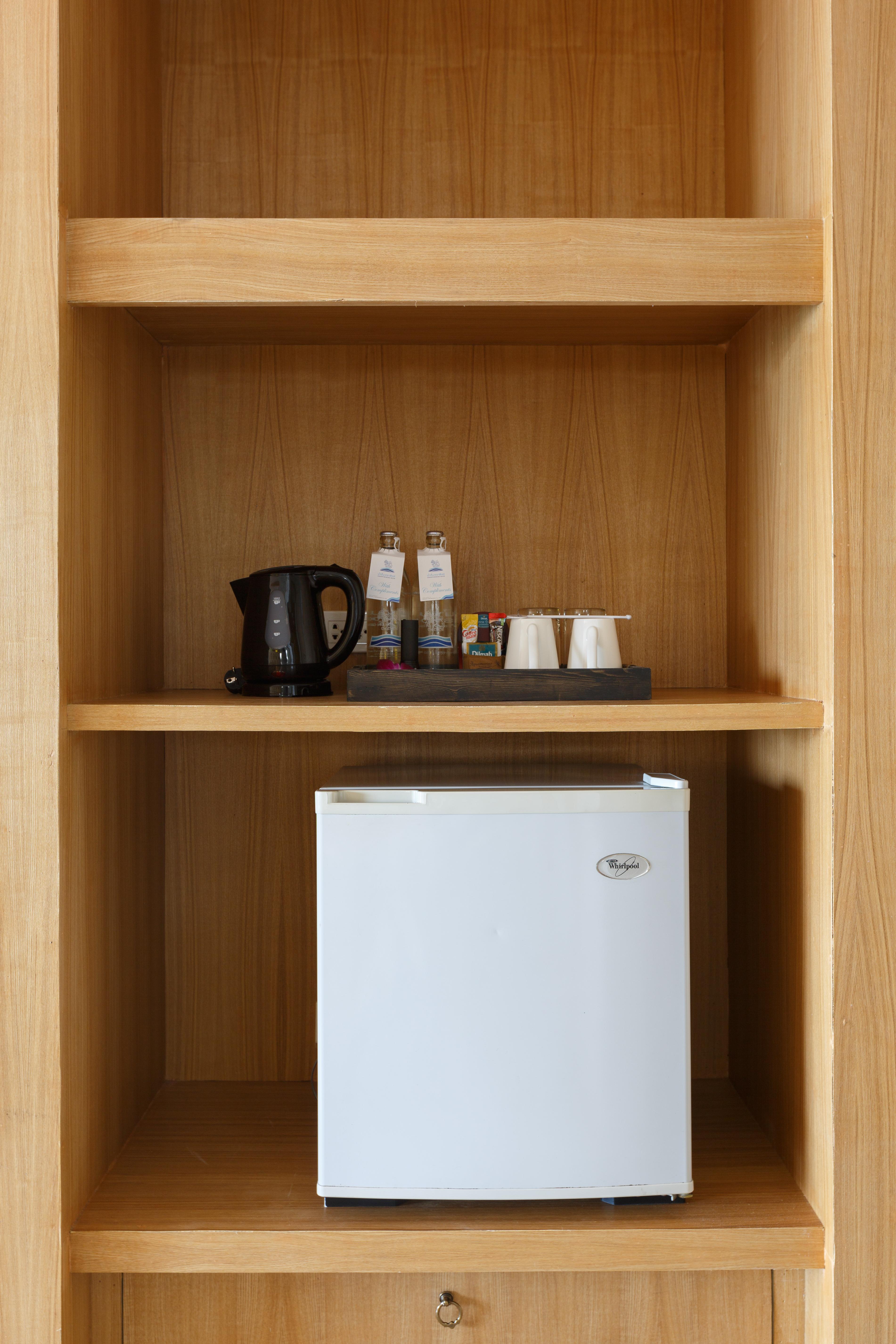 Namaka Resort Kamala Exterior photo A small refrigerator in a hotel room